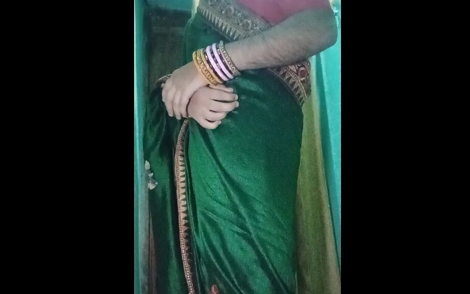 Indian Gay Crossdresser Gaurisissy In Green Saree Pressing Her Big