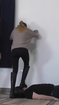 Olga and Natasa Love to Trample the Slave in Boots