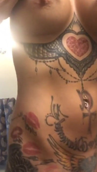 Busty Tattooed Babe
