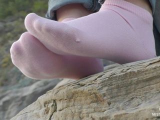 Mistress Legs: Sexy feet in pink ankle socks on the seashore