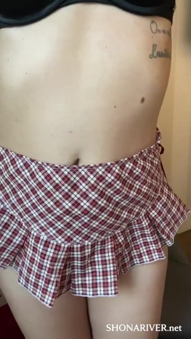 Shona River: Hot young girl in a college girl cosplay uses a...