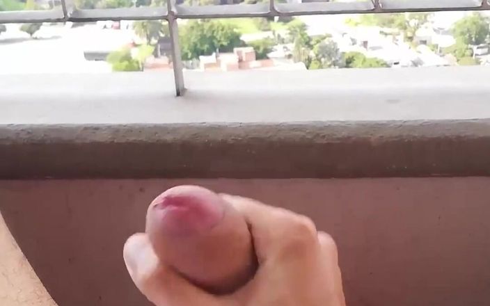 Camilo Brown: Masturbating on my balcony.