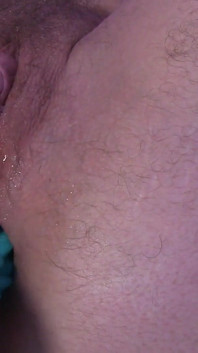 Stretched Ass Grips a Toy