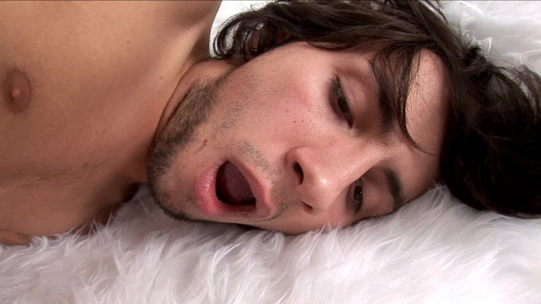 Gay Deluxe: Hot young guy masturbating on the bed
