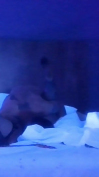Couple Having Fun in Blacklight