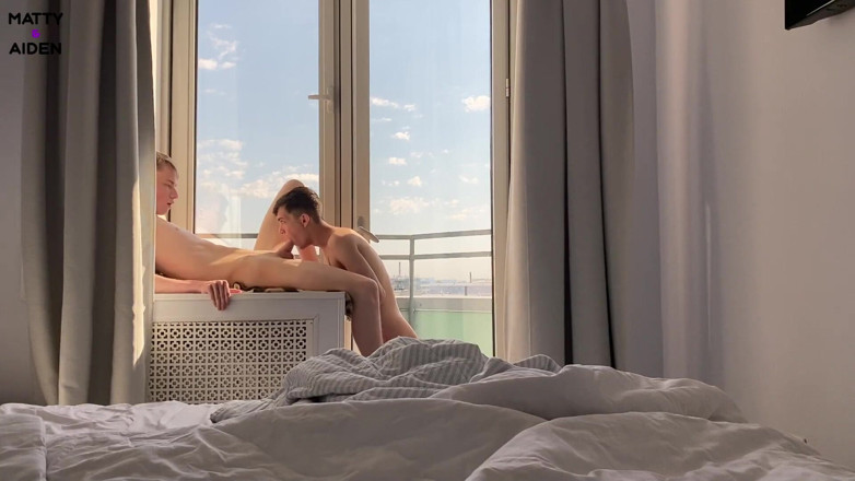 Matty And Aiden: Twink Matty sucks his young friend Aiden on a balcony