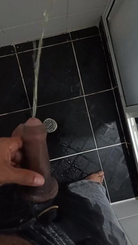 Urinating in Dark Jeans
