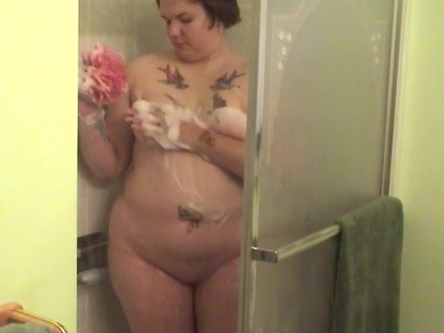 Tattooed fat chick strips to wash her tits and cunt in the shower--Solo Sensations