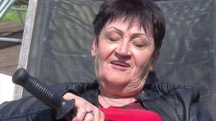 Solo Sex: Granny enjoys dildo in garden