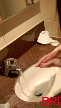 Student Taking A Piss on the Toilet