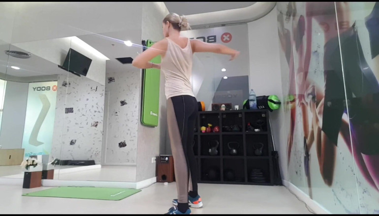 Erotic Tanya: Blonde teen warming up before workout