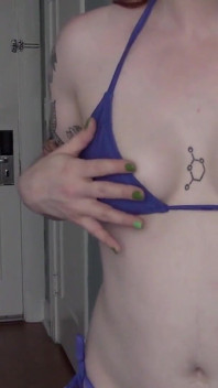 Tattooed Redhead Bikini Tease