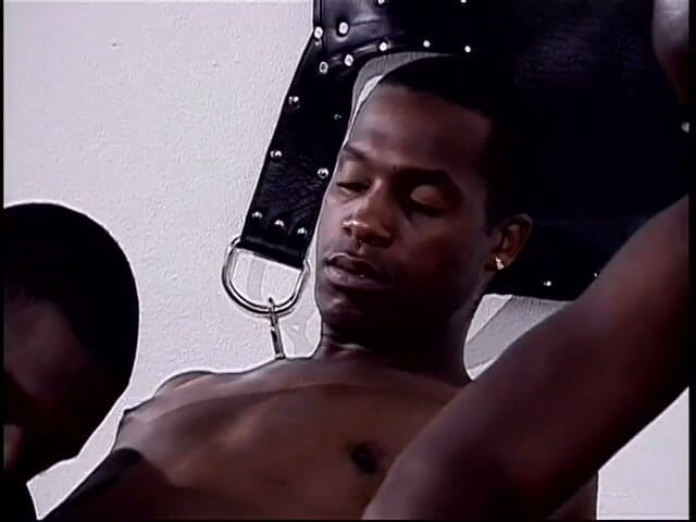 Gays Case: Black stud relaxes on the couch while his hard shaft...