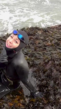 Rubbery Beach Encounter: Lucy's Neoprene Pussy Play with Stranger