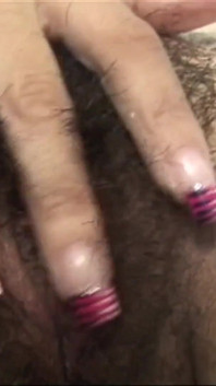Mora gets excited while taking a hot bath and satisfies her hairy pussy by masturbating it