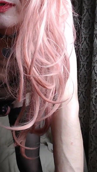 A Transvestite, a Slutty Girl in a Maid's Dress, Records Herself on Webcam
