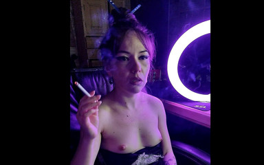 Blowjobs Alice: A beautiful lady smokes a cigarette