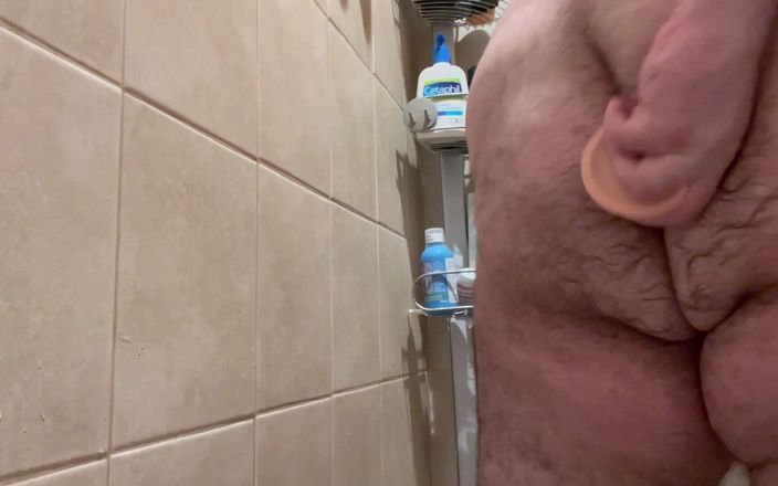 Masked chaser and bear: Bear Shoves Dildo up His Ass Before Showering