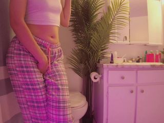 Kinky home: Emily pissing in the bathroom