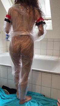 Sue, Cleaning the Bathroom in a Pvc Suit!