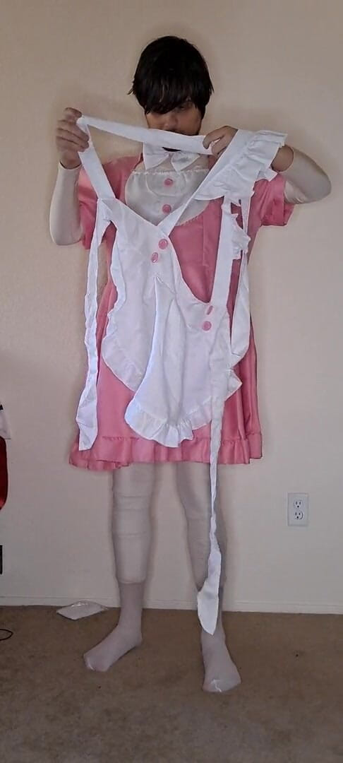 Pup Zentai: Pink spandex maid dress up