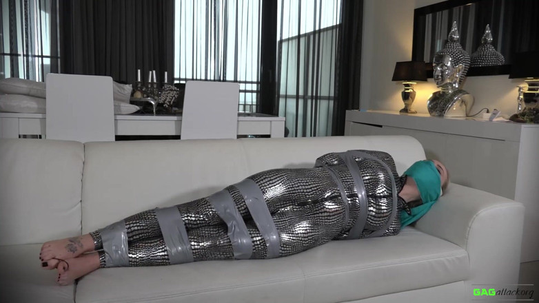 Gag Attack: Aubrey - tejp bondage i catsuit