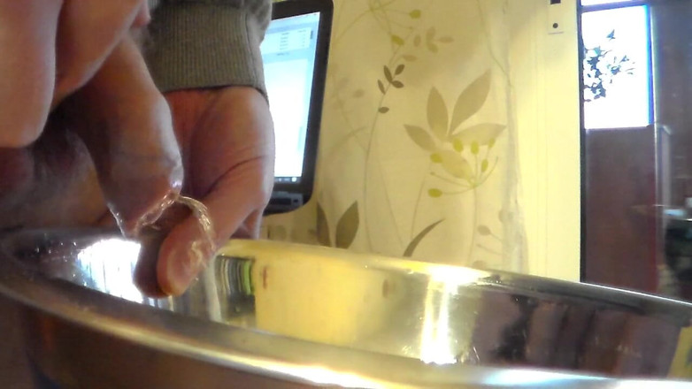 Sex hub male: Closeup of John peeing into a steel bowl