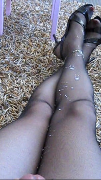 Dani Leg in Black Pantyhose and Pretty Dress and Hills with Polished Nails