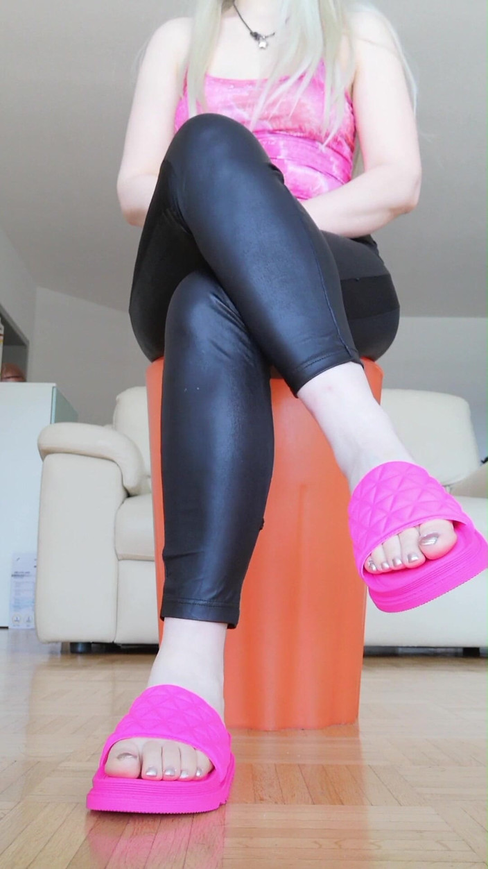 RavenBigAss: Raven: Toe-tapping with Crossed Legs Latex Trousers and Fuchsia Slides