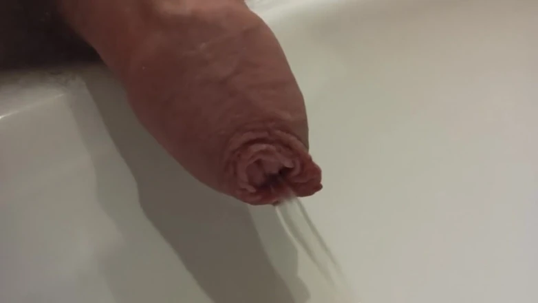 Kinky Guy: Morning Long Foreskin Pee Closeup