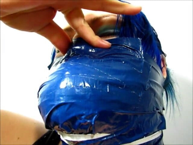 Selfgags classic: Layla makes herself another cruel, tight, and massive gag with 18...