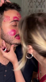 Non Stop Lipstick Kisses All Over His Face