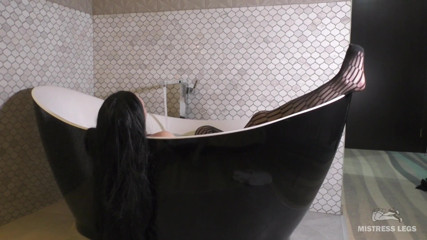 Mistress Legs: Mistress legs in black fishnets in bath tease and ignore