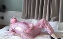 Nottstvslut: La sissy in abito pvc rosa ed il cappuccio