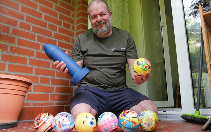 Qualzucht: Extreme Dildo and Ball Games on the Balcony