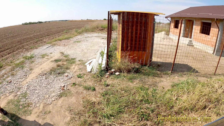 Pee Adventures: Chubby girl pissing in front of a house in construction