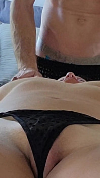 Fire Side Massage with the Lady in Black Seen on the Screen