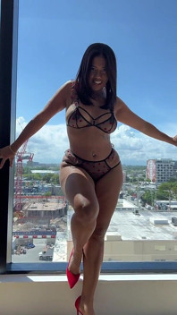 Amaya Blue Strips and Plays with Her Pussy by the Window
