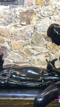 Rubber Slave Is Used Sexually