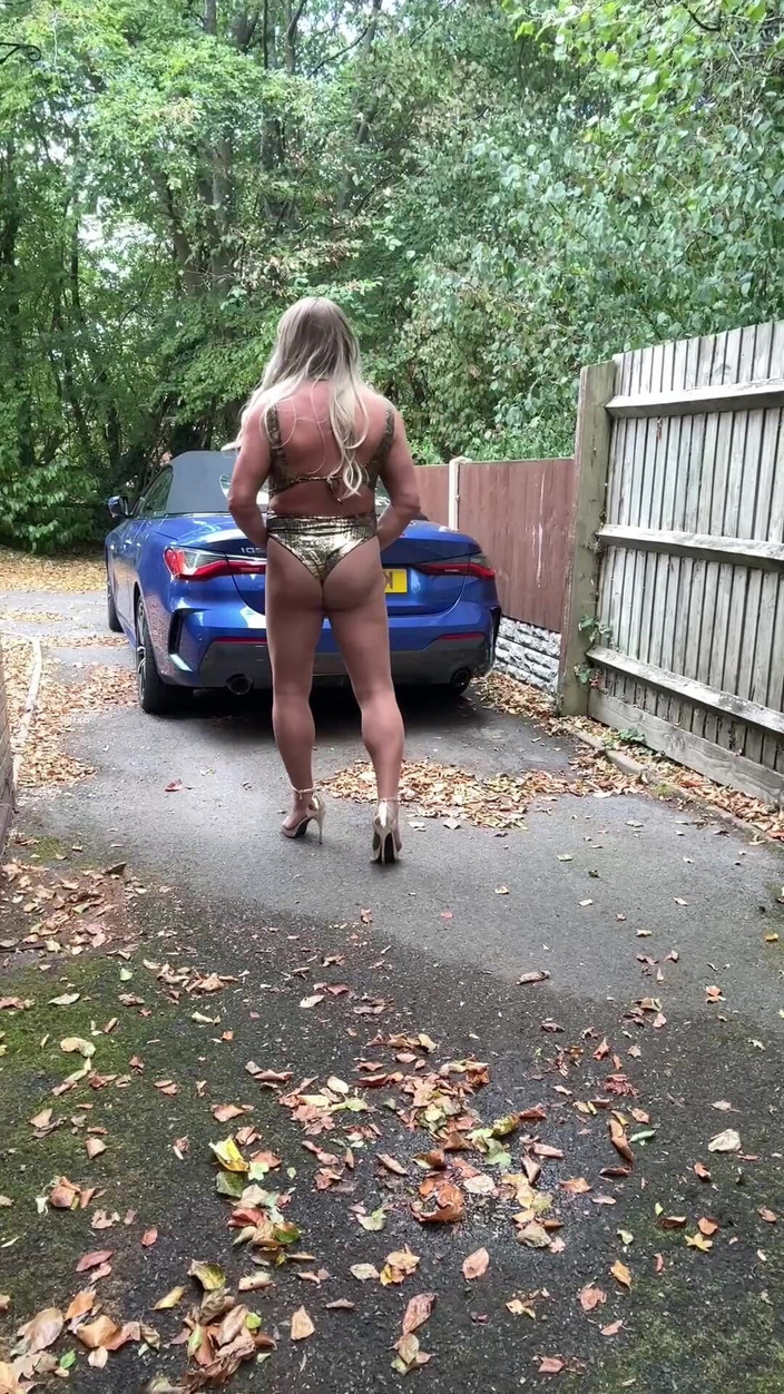 Kellycd2022: Sexy Crossdresser Kellycd2022 in Gold Swimsuit and Heels Clearing Leafs