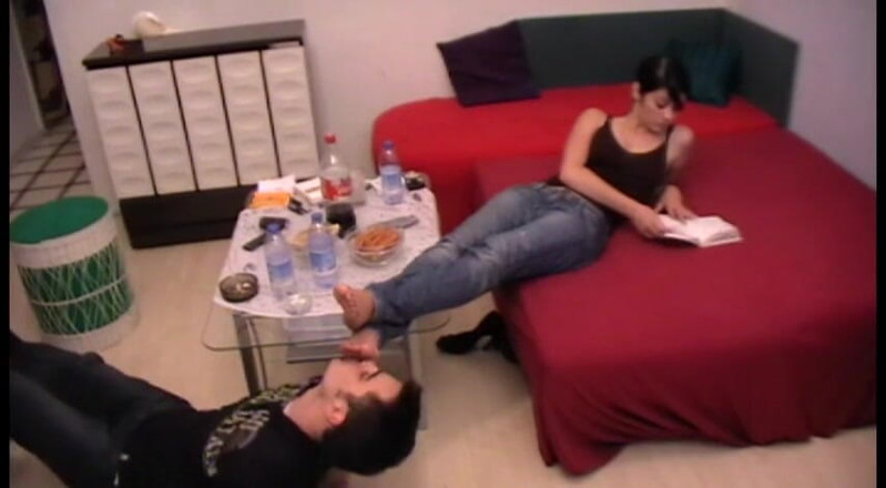 Femdom Austria: Licking feet by the coffee table