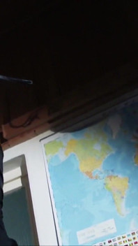 Yasemin chained to the ceiling
