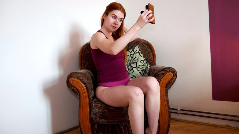 Peaches and Bananas: Pretty ginger teen masturbating in the chair