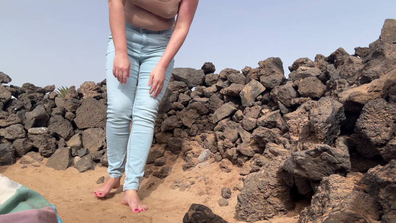 Emma Voyeur: Beach Jeans Wetting - Sandy and Soaked