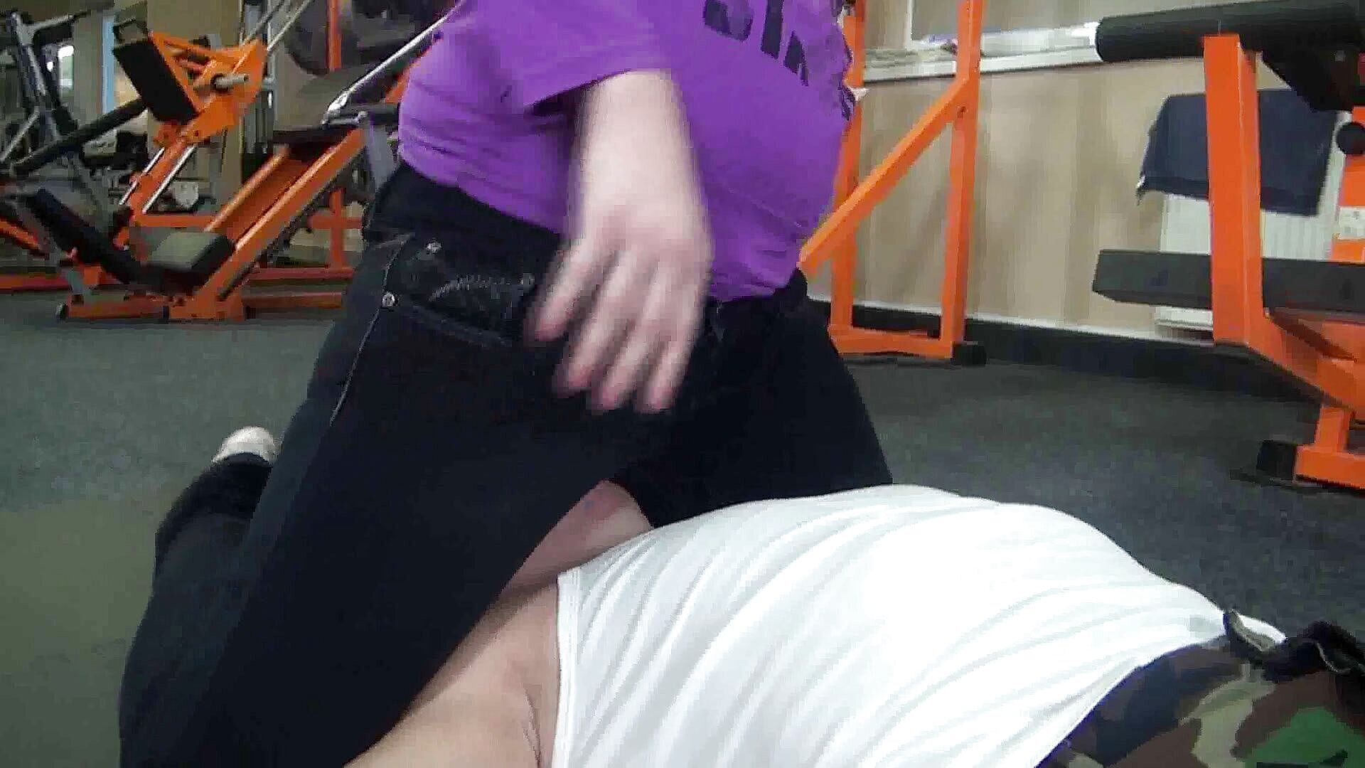 Blonde slut with glasses and her slave in gym--Femdom Austria