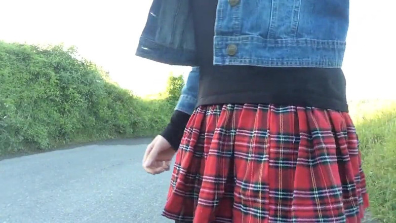 The Midnight Minx: Minx in denim jacket and tartan skirt