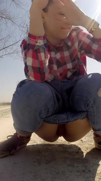 Desperate Babe with Full Bladder Empty Her Bladder and Pee on a Dirt Road