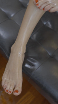 Blonde MILF Plays with a Dildo Using Her Oiled Feet Like a True Foot Goddess
