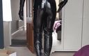 Jessica XD: Latex Sissy Doll zipping up her thigh high boots and...