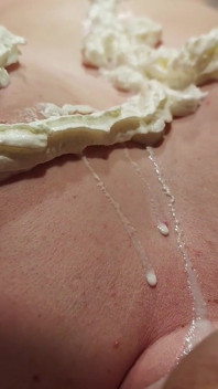 A Naked Woman with Huge Tits in a Massage Parlor Using Whipped Cream.